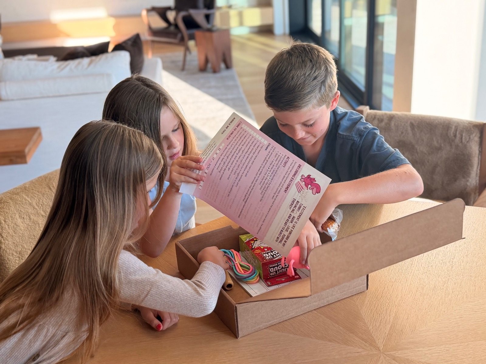 Kids opening the My Mama Says excitement box