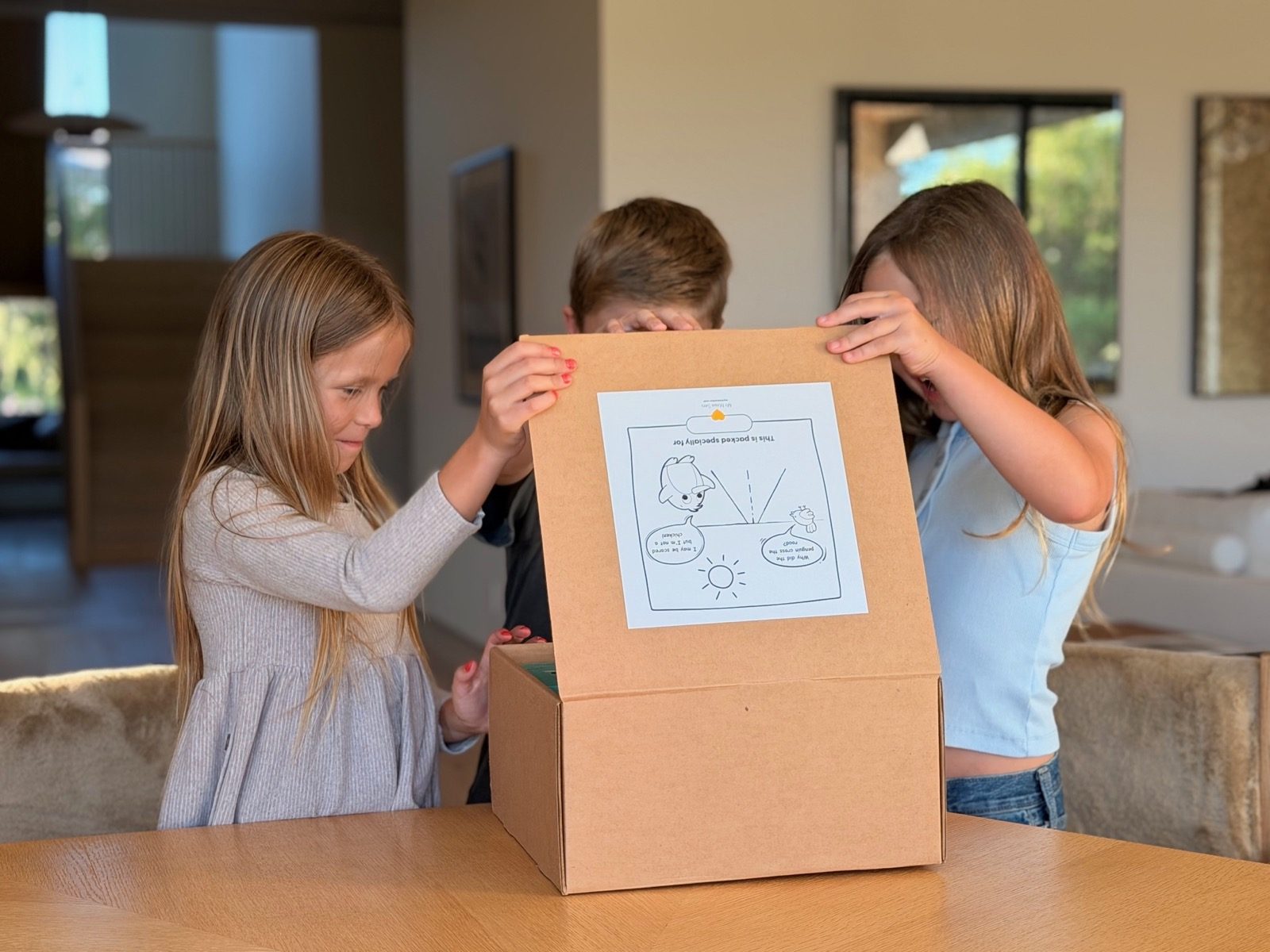 Kids opening the My Mama Says fear box