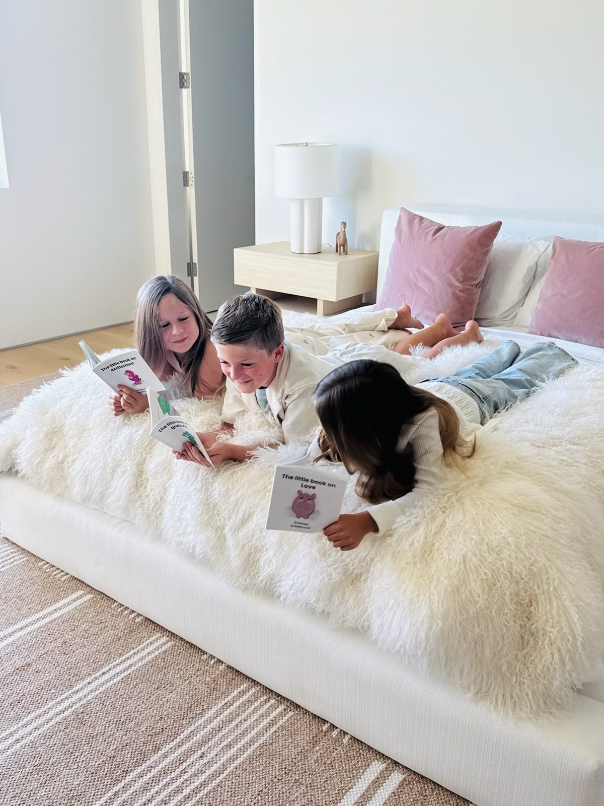 Kids reading the little books